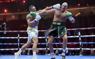 Oleksandr Usyk (left) lands a punch on Tyson Fury during the fight at Kingdom Arena, Riyadh (Nick Potts/PA)