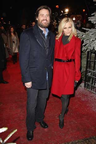 Actor Jim Carrey and Jenny McCarthy arrive for the world film premiere of Disney's A Christmas Carol at the Odeon Leicester Square last night.