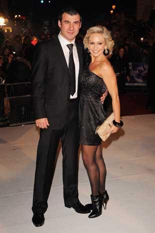 Boxer Joe Calzaghe and Kristina Rihanoff arrive for the world film premiere of Disney's A Christmas Carol at the Odeon Leicester Square last night.