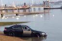 A BMW takes a plunge in the Thames at Gravesend.