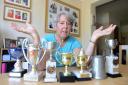 Wendy Scott with her mysterious set of trophies