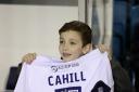 A fan holds up a shirt with Tim Cahill's name on the back. Photo: John Walton/PA Wire