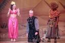 The Spirit of the Ring (Kelly Chinery) and the Genie (Nathaniel Morrison) exact their revenge on the evil Abanazar (Larry Lamb) in Fairfield Halls' panto Aladdin