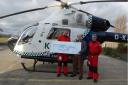 Lion John Scott presents a cheque to Kent Air Ambulance