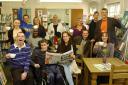 Bexley Community Library cafe staff celebrate with a News Shopper.