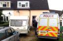 Police enter a house in Myrtle Place, Stone, this morning.