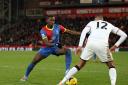 Pocketing the points: Yannick Bolasie and team-mate Jason Puncheon gave the Chelsea defenders a torrid time on Saturday