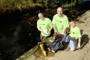 Dartford Council leader Councillor Jeremy Kite gets stuck in and helps clean a river
