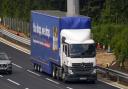 Threats of a HGV driver shortage could hit deliveries across the UK, leading to some business paying bonuses. (Steve Parsons / PA)