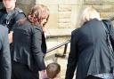 Jack, the son of murdered Fusilier Lee Rigby, arrives with his mother Rebecca, left, for his father's funeral