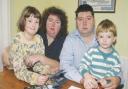 Andrea and Paul Gallagher with their children Heather, seven, and Andrew, three	BR5976/A