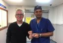 Robert Begent and Professor Dasgupta (holding a 3D model of Mr Begent's prostate)