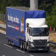 Threats of a HGV driver shortage could hit deliveries across the UK, leading to some business paying bonuses. (Steve Parsons / PA)
