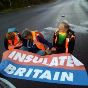 Handout photo issued by Insulate Britain of protesters from Insulate Britain blocking a roundabout at Junction 3 of the M25. The environmental activists have indicated they will continue blocking the M25 despite facing up to two years in prison. (Sept