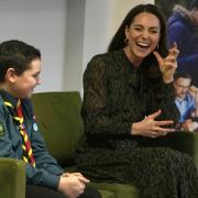 The Duchess of Cambridge sits beside scout Leo Street during a visit to Shout in London to mark the mental health text service reaching over one million conversations with those in need (photo: PA)
