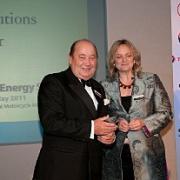 Eric Osborne of Savex ESL receives his company's award from Joanna Watchman, chief executive of the Energy Show