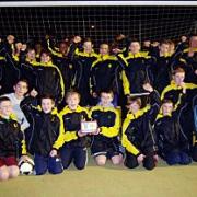 Bexley's U13 and U14 Kent youth north division teams proudly show off the charter standard development plaque