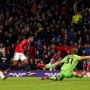 Marcus Rashford scores Manchester United's third. Picture: Martin Rickett/PA