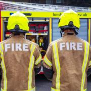 Person treated by paramedics after Dartford garage fire