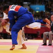 Charlton Judo player Gemma Gibbons (left) throws France's Audrey Tcheumeo to win her semi- final of Women 78 kg category at ExCel Arena (Photo: PRESS ASSOCIATION)