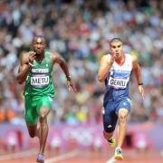 Adam Gemili competes with Obinna Metu Men's 100m heats (Picture by Martin Rickett/PA Wire)