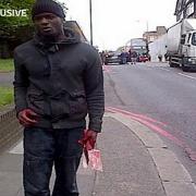 Murderer Michael Adebolajo with a meat cleaver after the killing; Picture credit ITV