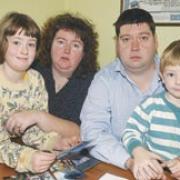 Andrea and Paul Gallagher with their children Heather, seven, and Andrew, three	BR5976/A