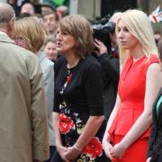 Prince Philip told this lady in red “I would get arrested if I unzipped that dress” on a visit to Bromley in 2012