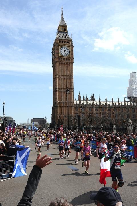 News Shopper: Runners making their way past Big Ben as part of the London Marathon yesterday
