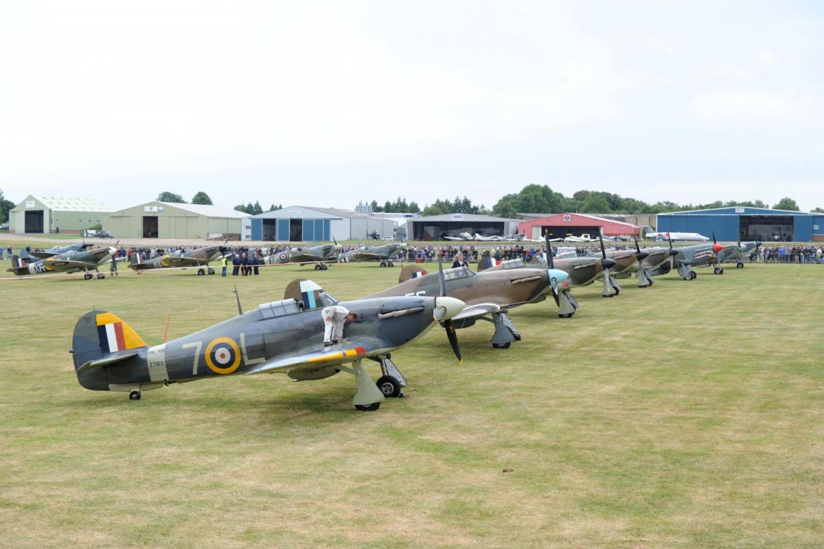 Spitfires and Hurricanes flew from Biggin Hill over south-east England to mark the Battle of Britain Hardest Day 75th anniversary.