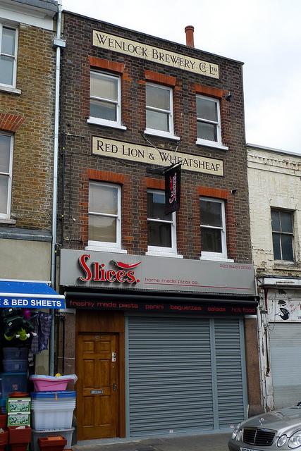 The Red Lion & Wheatsheaf was situated at 45 Deptford High Street. Now used as a pizza takeaway. This pub was formerly known as The Red Lion and The Distillery Picture: closedpubs.co.uk & Ewan M