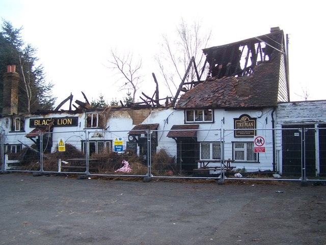 The Black Lion was situated on Red Street, Southfleet, and closed in 2008 following a fire. Picture: closedpubs.co.uk & David Anstiss