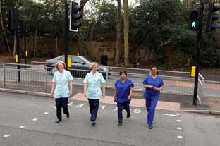 Staff have a go at crossing
