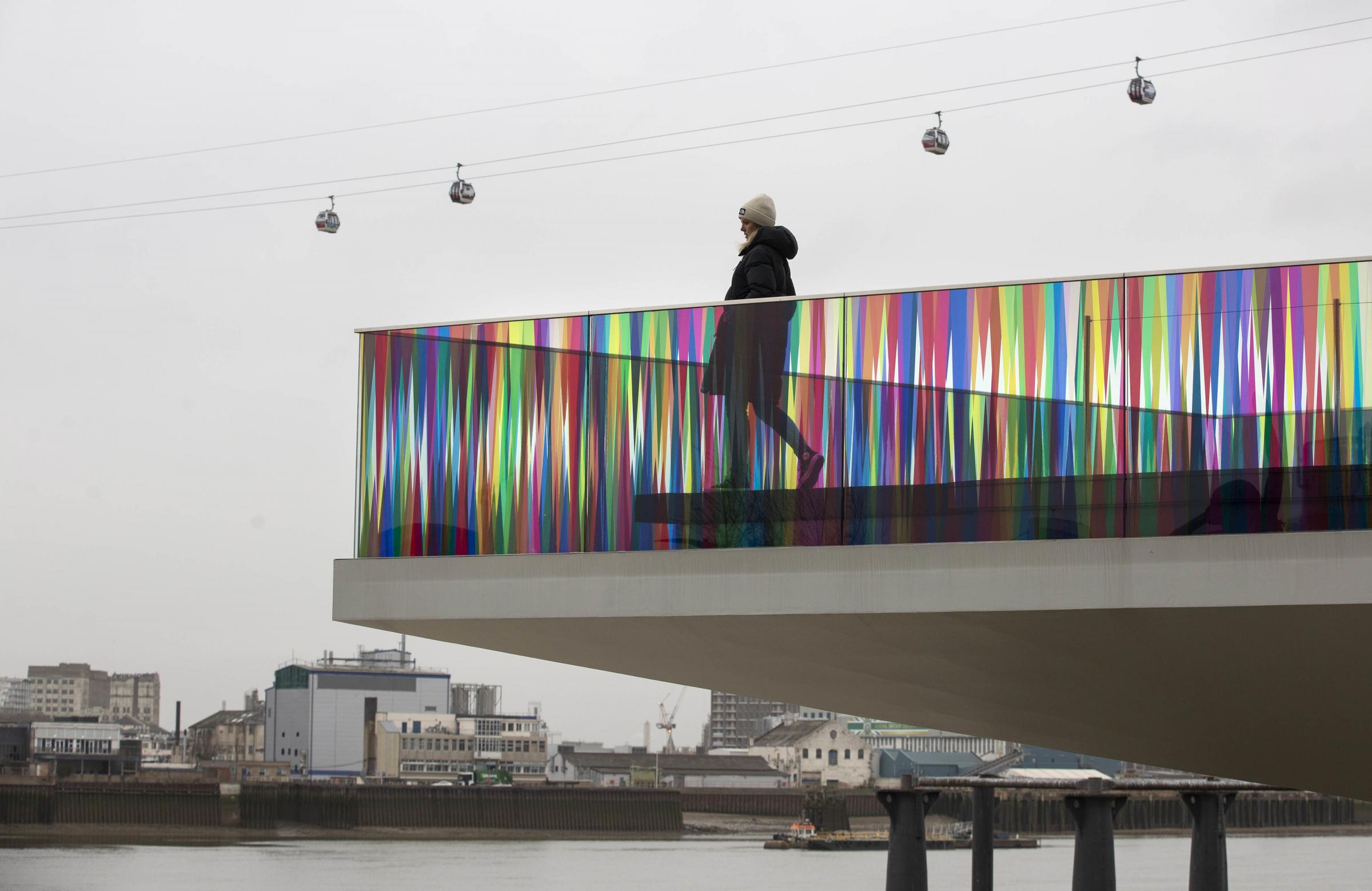 An art installation entitled Hundreds and Thousands, by artist Liz West which has been commissioned by Greenwich Peninsula is unveiled by the riverside in Greenwich, London.