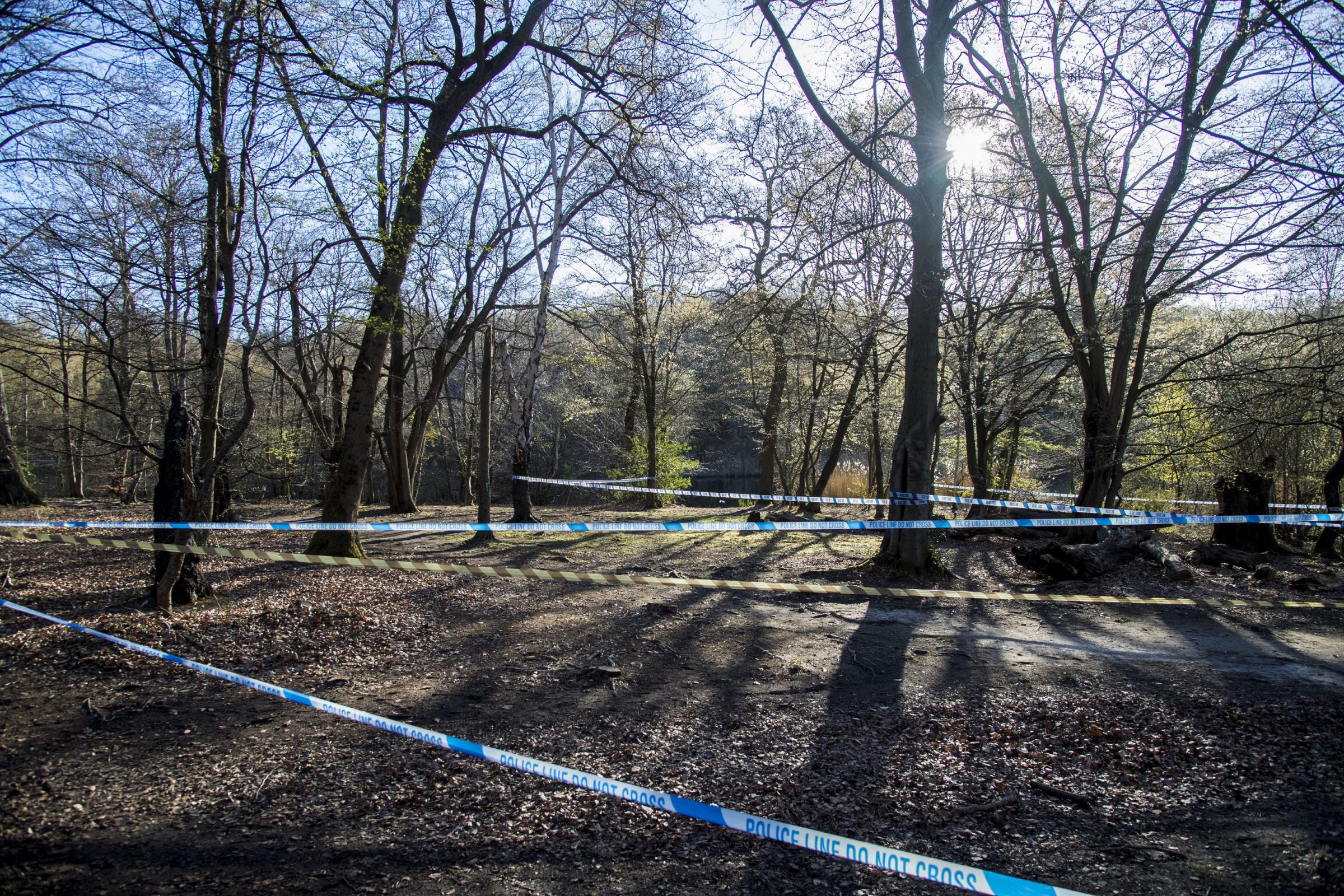 Police tape surrounds Wake Valley pond in Epping Forest following the discovery of a mans body. Ian West/PA Wire 
