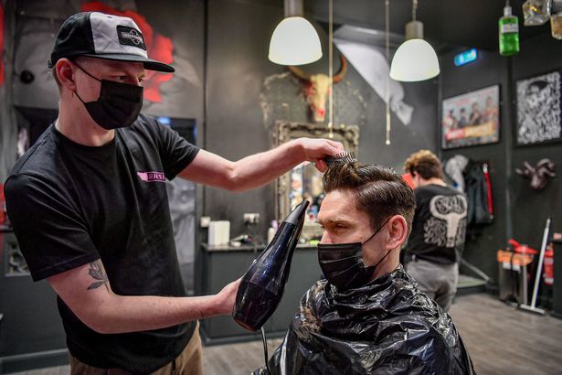 PA Wire - Barbers are now reopen in the UK