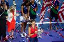 Great Britain's Emma Raducanu poses with the trophy after winning the women's singles final on day twelve of the US Open at the USTA Billie Jean King National Tennis Center, Flushing Meadows- Corona Park, New York. (photo: PA)