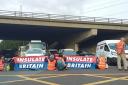 Insulate Britain activists blocking traffic (Insulate Britain)