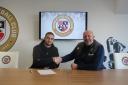 Mitchell Bergkamp shakes the hand of Bromley manager Andrew Woodman after signing for the club