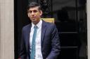 Rishi Sunak has been compared to a 'cardboard cut out' after standing next to the tallest UK MP