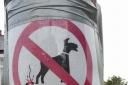 Olive Elisa Day spotted this humorous threat to dog owners in Catford