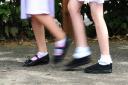 Embargoed to 0001 Wednesday August 15..File photo date 15/07/14 of two children.  Parents will spend an average Â£244.90 on kitting out each child to return to school next month, a survey suggests. PRESS ASSOCIATION Photo. Issue date: Wednesda