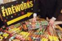 Clive Davison and David Bullar from trading standards with the seized fireworks	BR3443/B