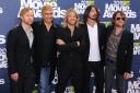 Foo Fighters (left to right) Nate Mendel, Pat Smear, Taylor Hawkins, Dave Grohl and Chris Shiflett at 2011 MTV Movie Awards. Picture: PA