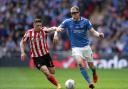 Sunderland's Lynden Gooch (left) and Portsmouth's Matt Clarke battle for the ball during the Checkatrade Trophy Final at Wembley Stadium, London. PRESS ASSOCIATION Photo. Picture date: Sunday March 31, 2019. See PA story SOCCER Final. Photo credit