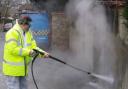 Mayor of Lewisham Sir Steve Bullock cleans graffiti