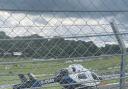 An air ambulance landing at Brands Hatch on Saturday, July 31