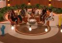 The Islanders around the firepit  on Love Island  tonight at 9pm on ITV2 and ITV Hub. Episodes are available the following morning on BritBox. Credit: ITV