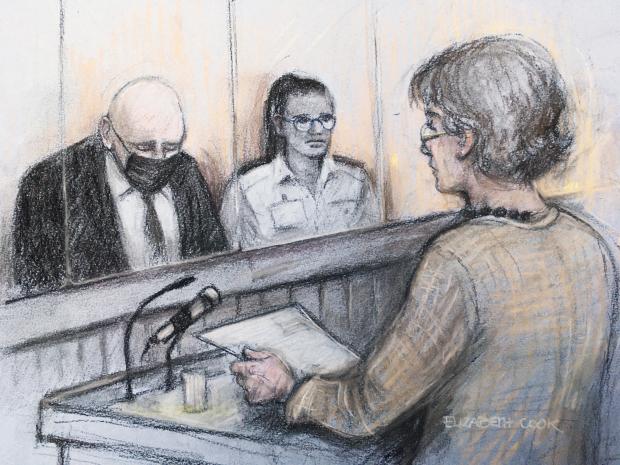 News Shopper: ourt artist sketch by Elizabeth Cook of Susan Everard (right), the mother of Sarah Everard, reading a victim impact statement as former Metropolitan Police officer Wayne Couzens (left), 48, sits in the dock at the Old Bailey in London, on the first day of a two-day sentence hearing after pleading guilty to the kidnap, rape and murder of Sarah Everard.