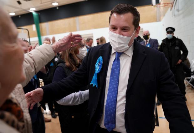 News Shopper: Conservative candidate Louie French greets supporters as he arrives for the Old Bexley and Sidcup by-election at Crook Log Leisure Centre in Bexleyheath
